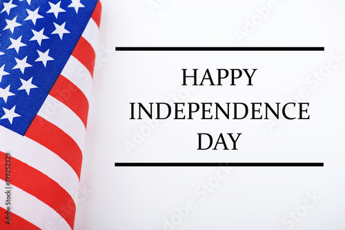 Background of United States flag on white background next to text about Independence day celebration.