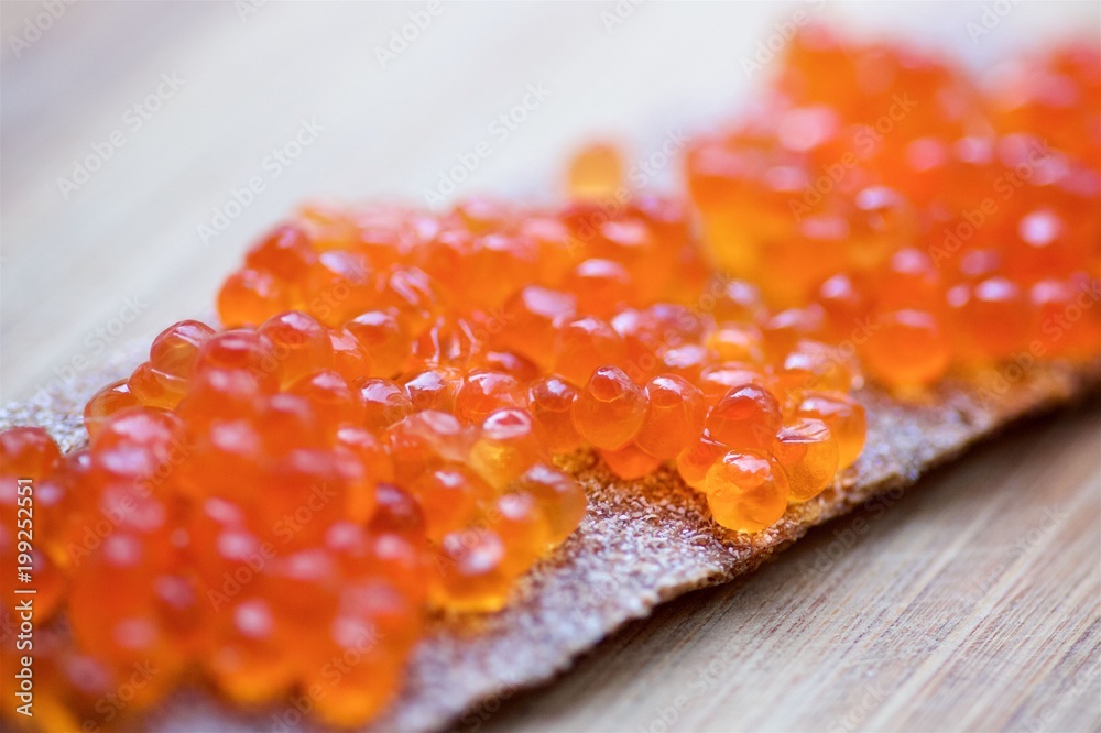 sandwich of bread and red caviar sandwich of bread and red caviar
