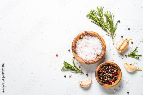 Fototapeta Naklejka Na Ścianę i Meble -  Spices and herbs over white stone table top view. 