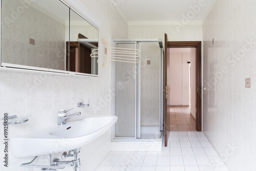 Retro bathroom in light tiles