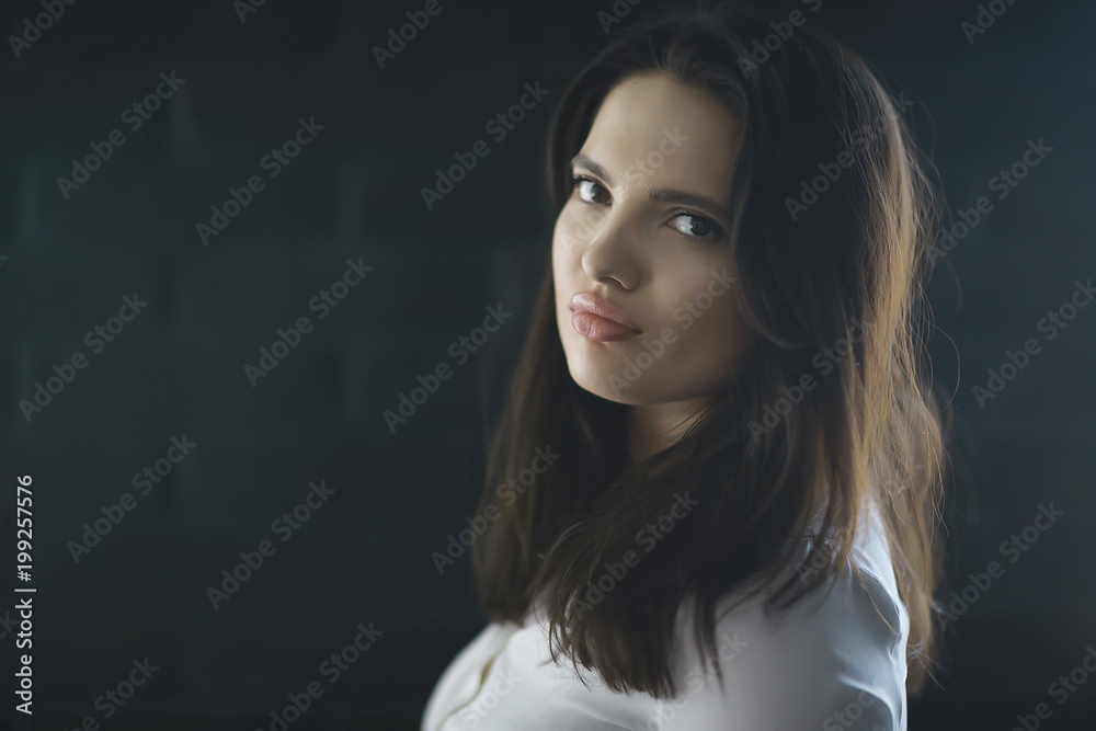 glamorous girl long hair large lips / concept beauty and fashion, young modern girl, bright fashionable appearance style.