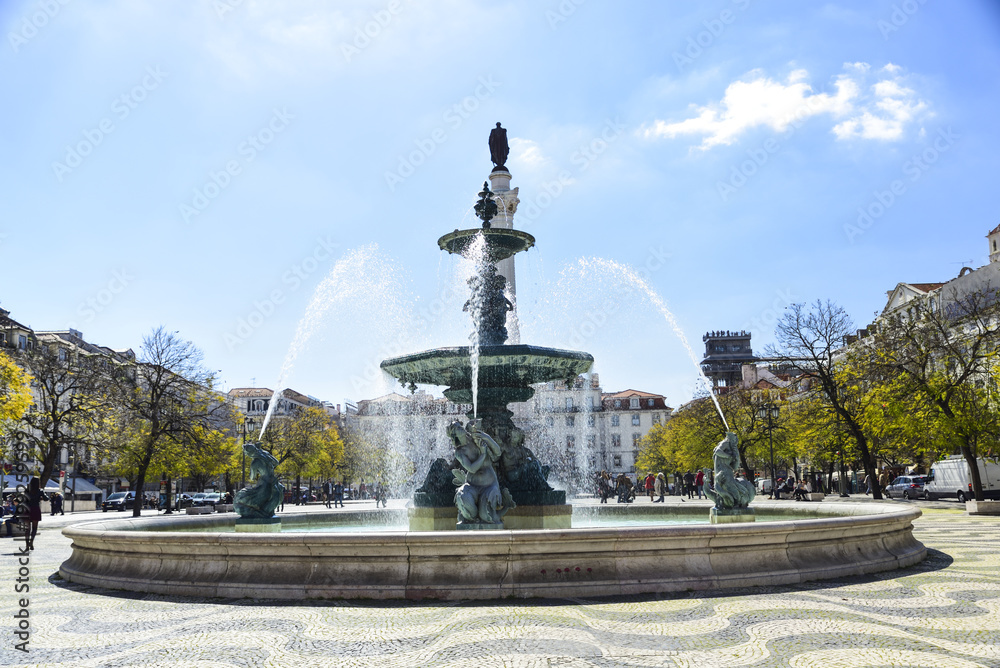 Baroque style fountain in Rossio Square Lisbon