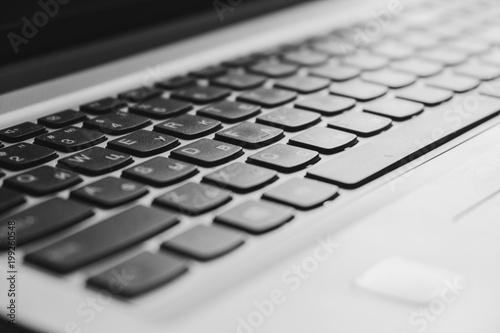 Laptop keyboard with focus on the keys close-up