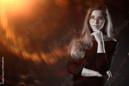 serious young woman with glasses / businesswoman serious look in glasses. concept vision business, youth