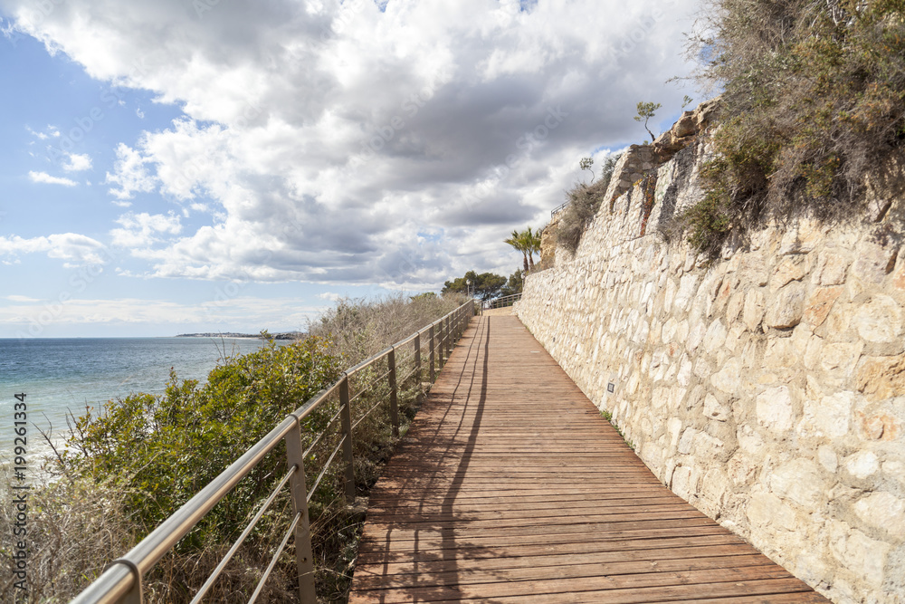 Footpath, Cami de Ronda close to Mediterranean sea in Roda de Bera, Costa Dorada, Catalonia, Spain.