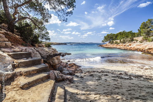 Mediterranean beach, Cala Gracioneta, town of Sant Antoni, Ibiza island,Spain. photo