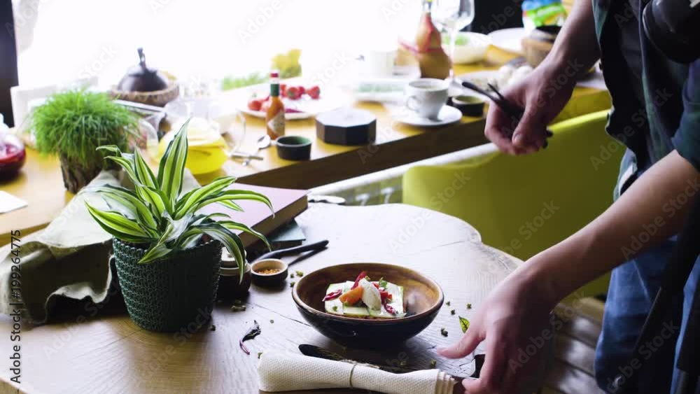 Food style specialist working on the asian style dish Food style specialist working on the asian style dish