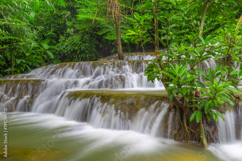 Fototapeta Naklejka Na Ścianę i Meble -  Noppiboon waterfall in Tropical Rain Forest at  Sangkhlaburi , Kanchanaburi Province, Thailand