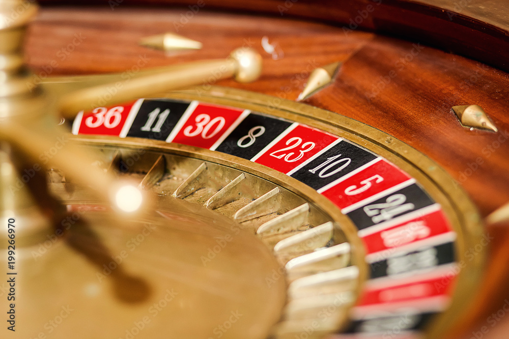 Roulette in casino and Poker Chips Roulette in casino and Poker Chips