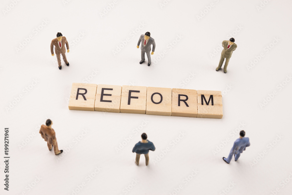 businessman figures meeting on reform conceptual businessman figures meeting on reform conceptual