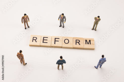 businessman figures meeting on reform conceptual