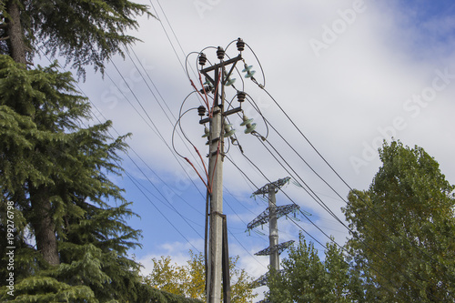 The old archaic electricity power line and the new one on backside