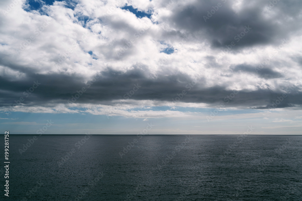Ocean and dramatic clouds Ocean and dramatic clouds