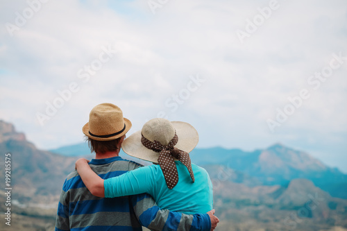 young couple hiking travel in mountains