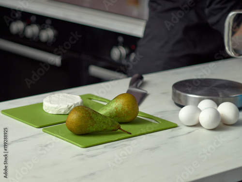 Photography Step-by-step preparation of black designer cake.