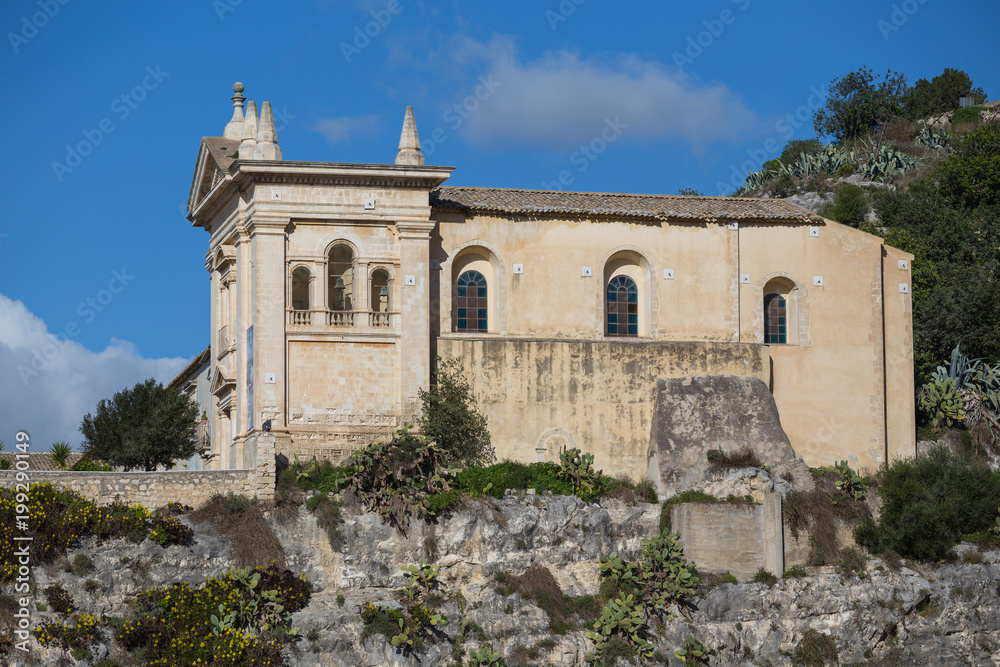 Side view of the Rock Church of the Rosary (Chiesa Rupestre del Rosario) and convent in Scicli, Sicily