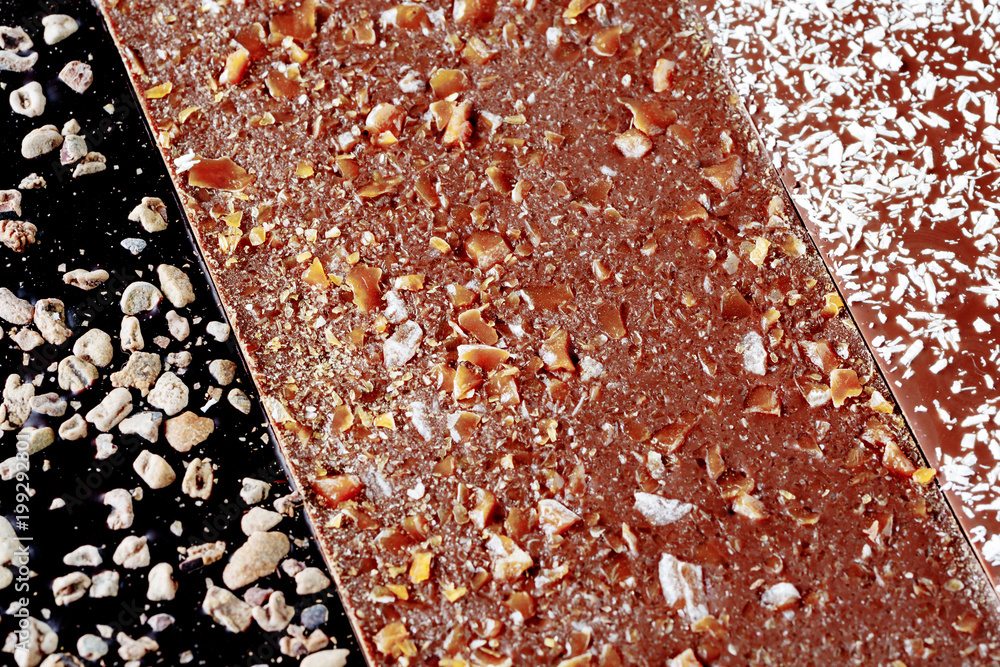Fototapeta premium assorted artisanal chocolate bars background