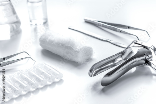 instruments of gynecologist on white background