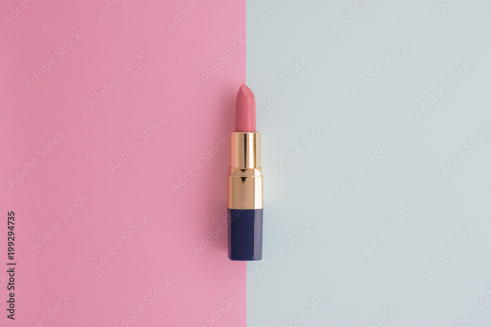 Flat lay of creative female cosmetic for pink lipstick on the colorful background with copy space Flat lay of creative female cosmetic for pink lipstick on the colorful background with copy space