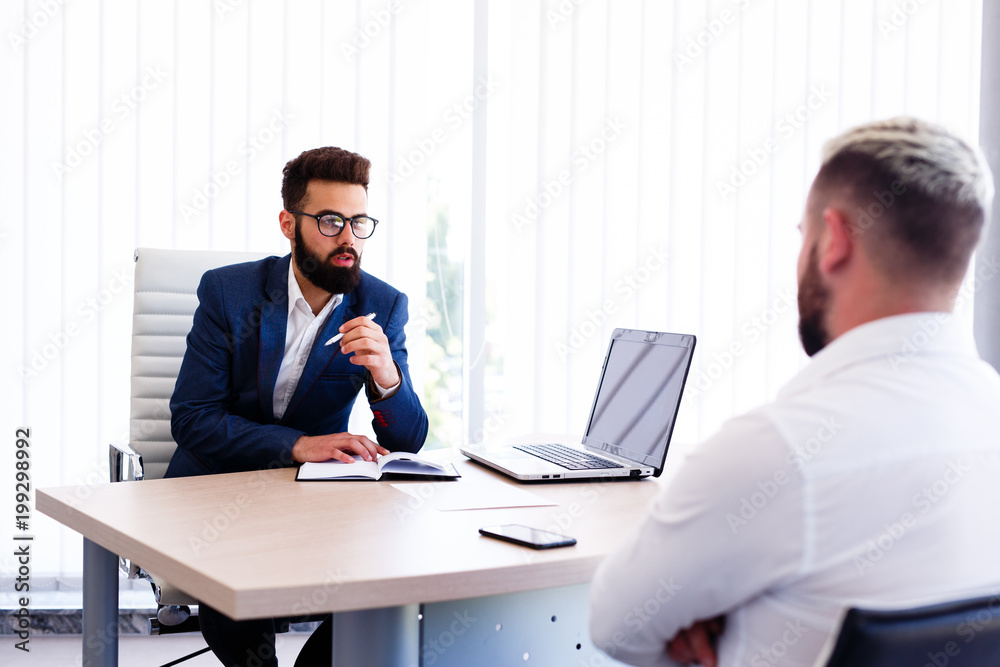 Young Businessman At Consulting With Lawyer Young Businessman At Consulting With Lawyer
