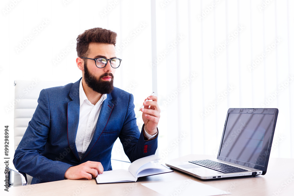 Young Businessman At Work Desk Young Businessman At Work Desk