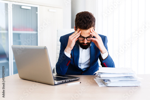Young Handsome Businessman Has Headache