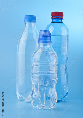 bottles of water on a blue background
