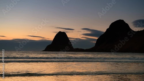 Sunset over Nykvåg beach at Vesteralen in Northern Norway photo