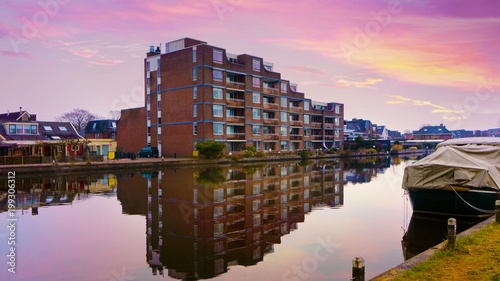  Sunset Strip . Modern apartment house . Traditional apartment house In Holland . Sunrise clouds 