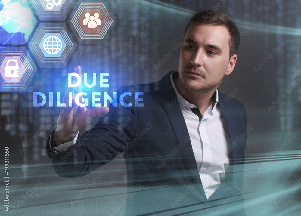 Obraz premium Business, Technology, Internet and network concept. Young businessman working on a virtual screen of the future and sees the inscription: Due diligence