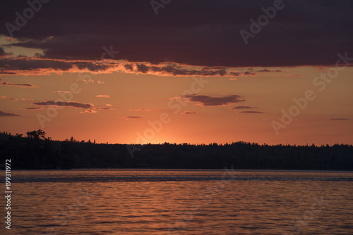 Scenic view of lake at dusk, Kenora, Lake of the Woods, Ontario, Canada