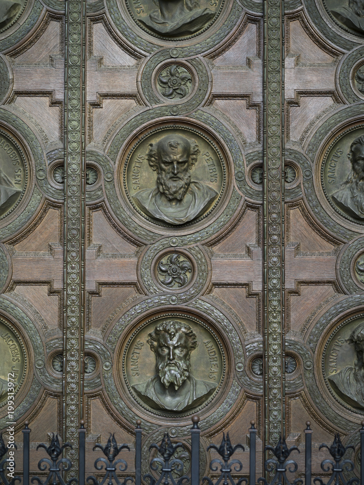 Carvings of faces on the door of St. Stephen's Basilica, Budapest, Hungary
