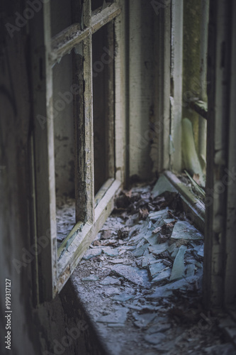Broken window in abandoned building © mephoto.se