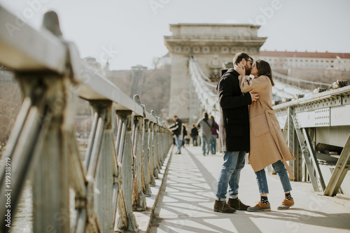 Loving couple on Chain bridge, Budapest