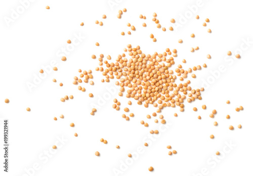 yellow mustard seeds isolated on white, top view