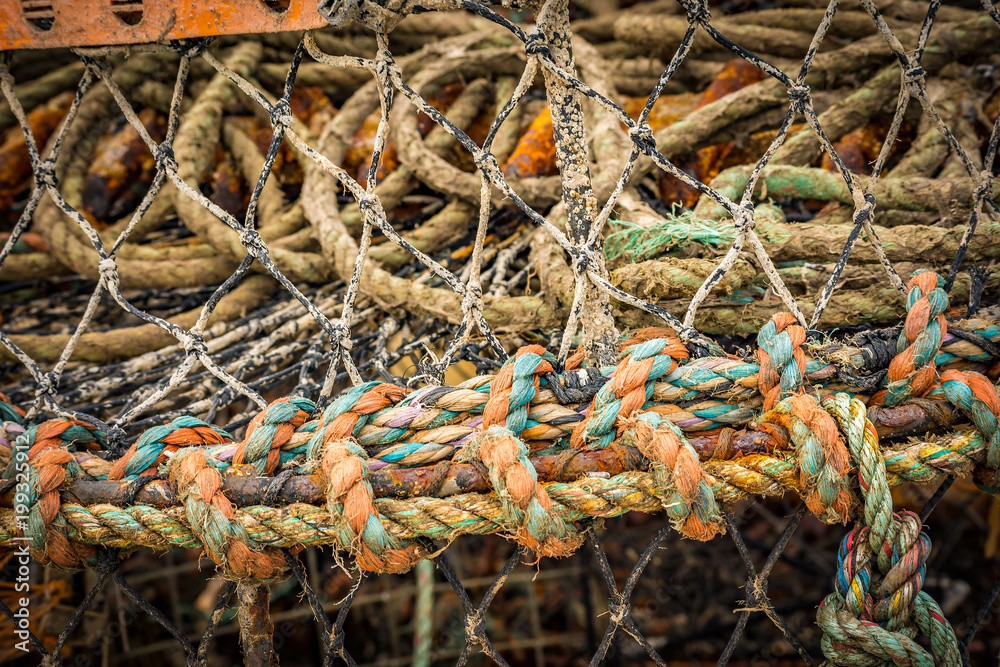 Colourful rope fishing net basket at Lyme Regis in England