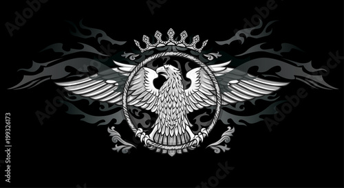 Spread winged eagle in ring dark insignia