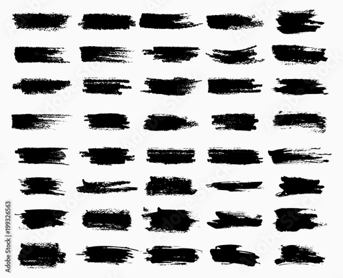 Horizontal black ink scratches or brush watercolor
