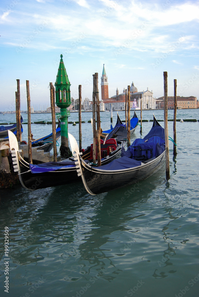 Gondolas with a view of the Basilica of San Giorgio Maggiore - Venice
