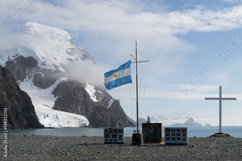 An argentinian flag waving at the Antarctica. Orcadas Base. Beautiful and cold landscape photo