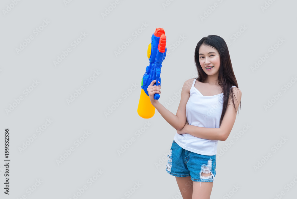 Asian sexy woman with water in hand on white background,Festival songkran day at thailand,The best of festival of thai,Land of smile Asian sexy woman with water in hand on white background,Festival songkran day at thailand,The best of festival of thai,Land of smile