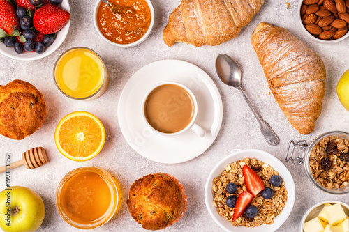 Continental breakfast with fresh croissants, orange juice and coffee.