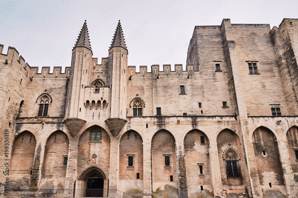 walls of the medieval Castle of the Popes in the city of Avignon in France. walls of the medieval Castle of the Popes in the city of Avignon in France.