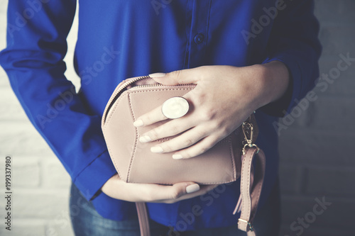 Woman hand fashion bag and ring
