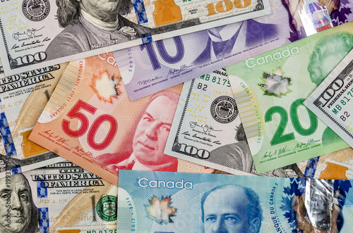 Obraz na plátne canadian and american dollar as background