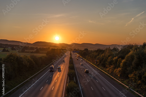 The road traffic on a motorway at sunset © wlad074