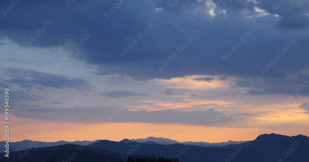 Sunset above Ridge mountains panoramaic landscape . Sunrise over nature background. Lovcen, Montenegro
