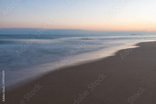 Colorful sunset sky and sea with blurred motion.
