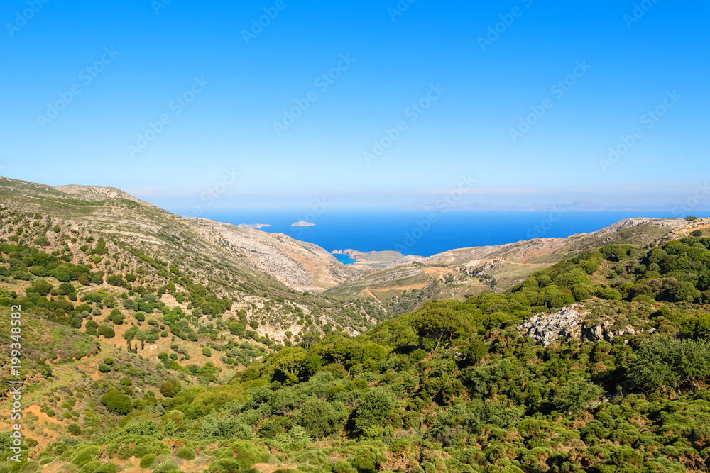 Beautiful view of sea coast in summer day. Naxos island. Cyclades, Greece Beautiful view of sea coast in summer day. Naxos island. Cyclades, Greece