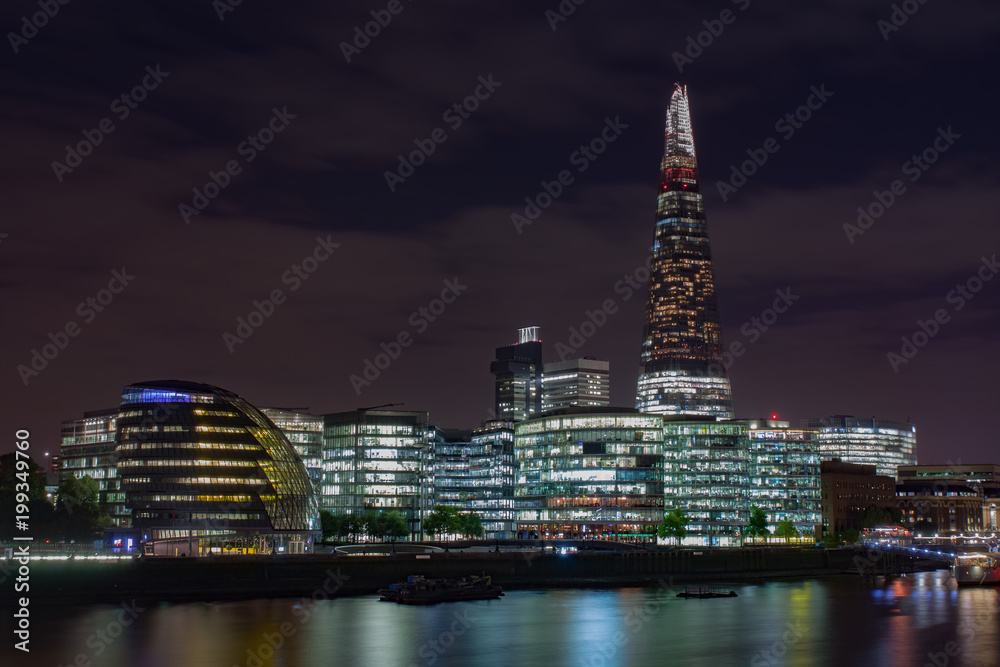 Buildings on the south bank of the river Thames in London at night. Buildings on the south bank of the river Thames in London at night.